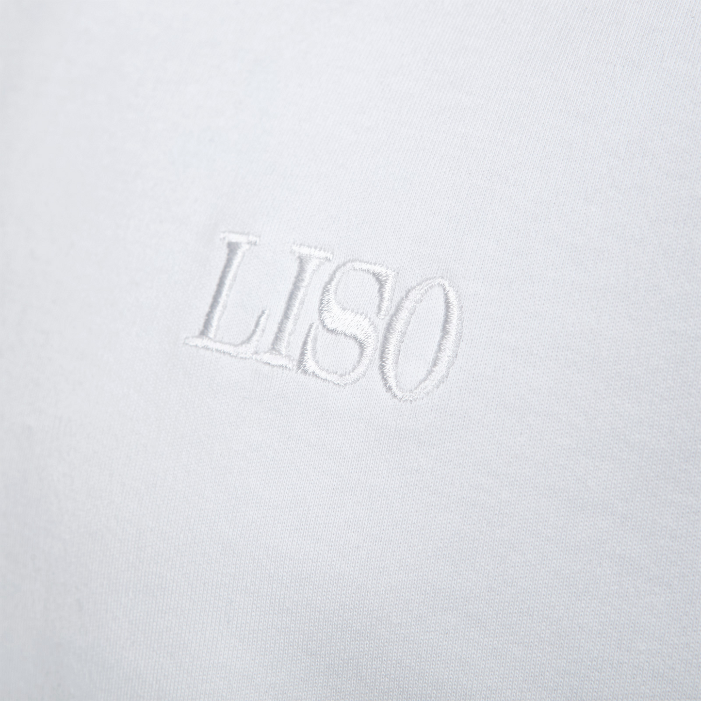 T-Shirt mit gesticktem Schriftzug - White